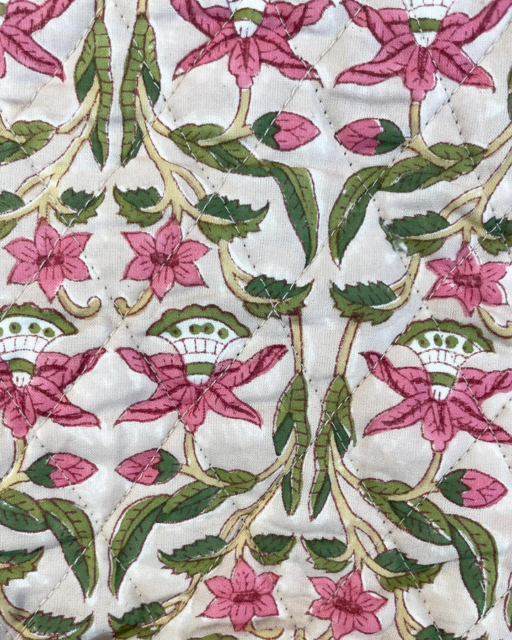 Dettaglio diamond quilting trapuntatura a rombi cotone stampato