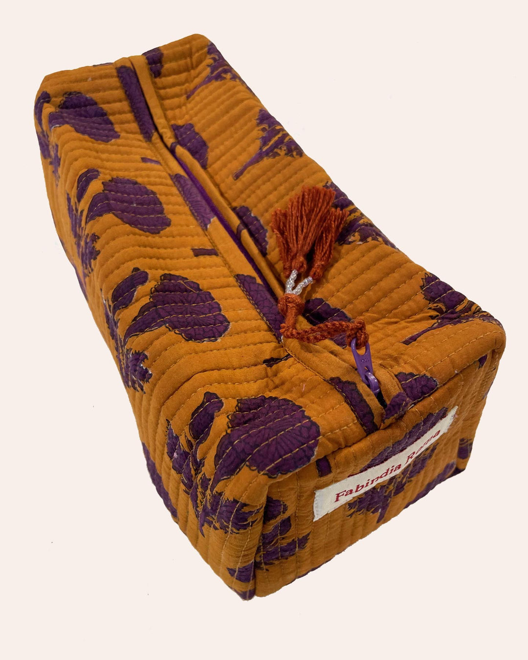 Astuccio trapuntato cotone viola e oro motivo calendula vista frontale